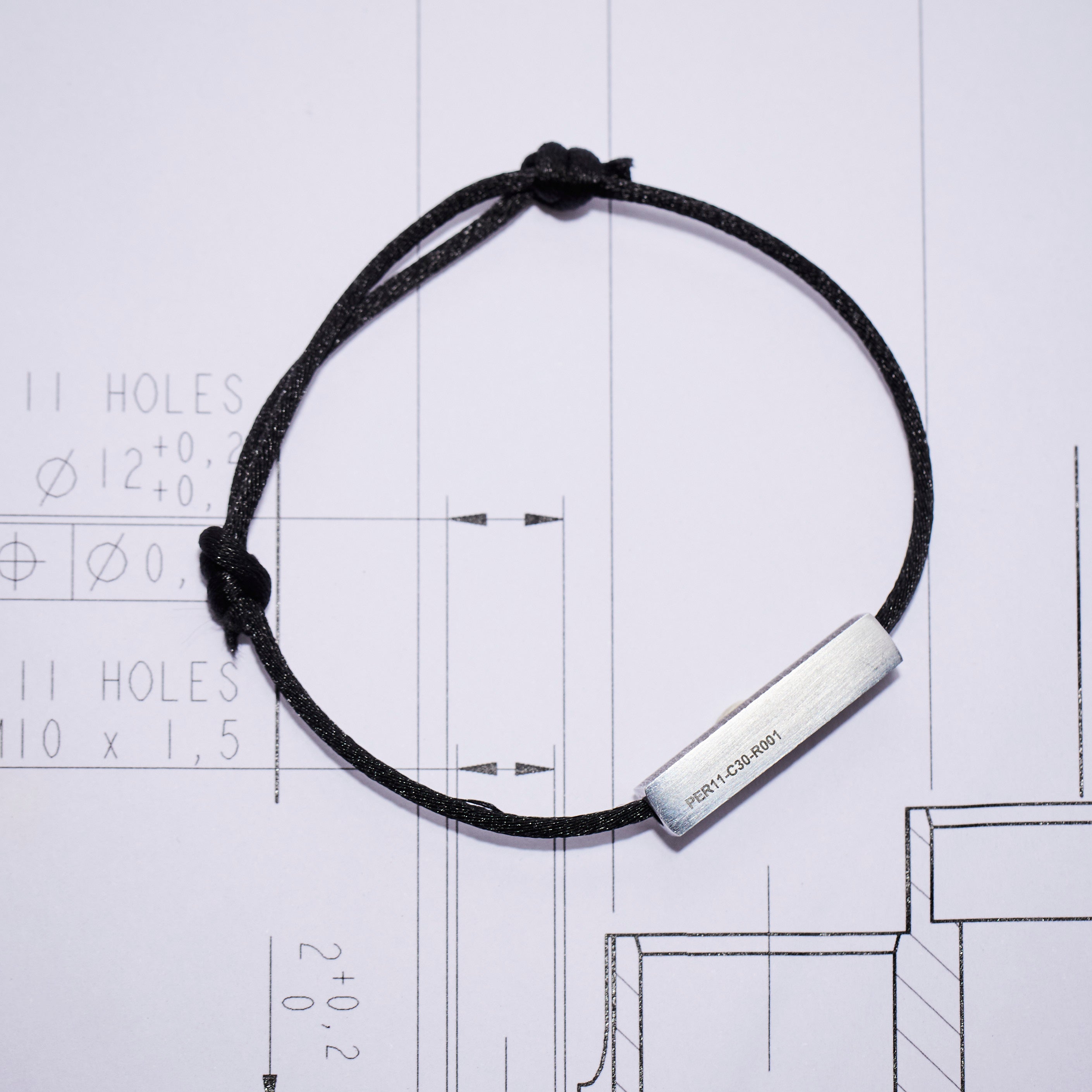 Jewellery made from the 2011 C30 Sauber Ferrari - Sergio ‘Checo’ Pérez's FIRST Formula One Car.